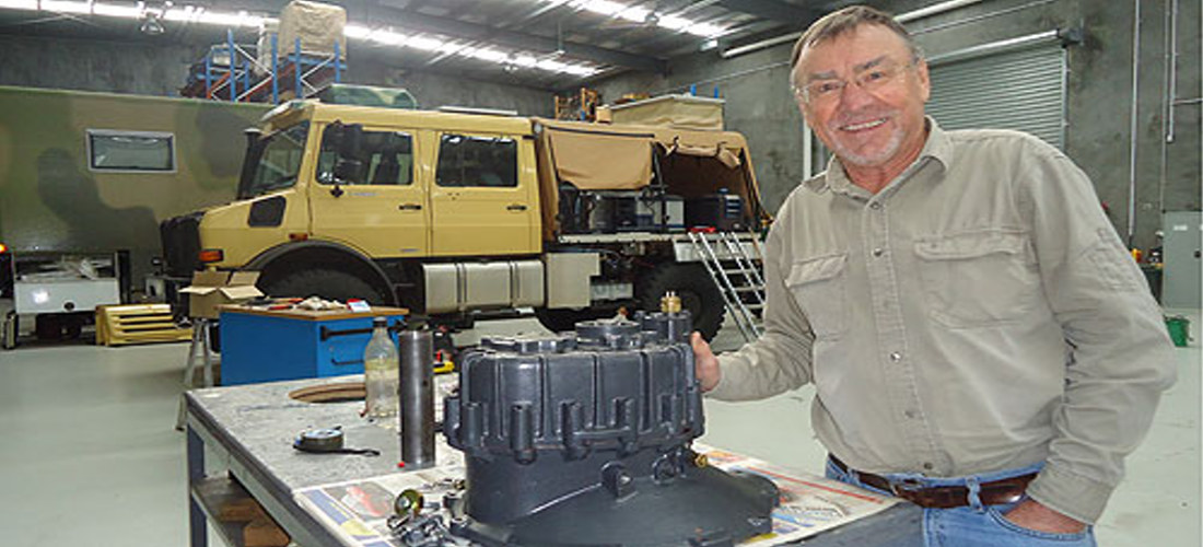 Larry- in his Perkins Engineering Workshop- still working on projects