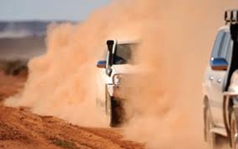 Light vehicle in dusty road